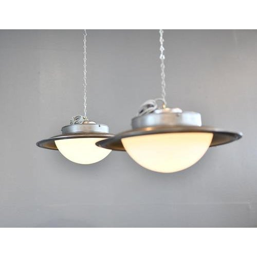 Ufo pendant lights by adolf meyer for zeiss ikon circa 1930s - price is per light (10 available) opaline glass dome...