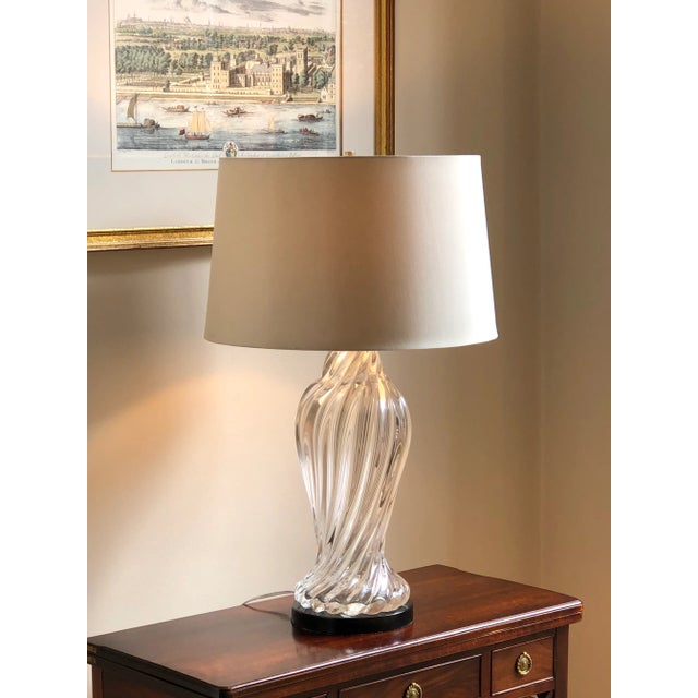 Offering an elegant mid-20th century Murano style handblown glass table lamp. This lamp features a nice heavy swirl and...