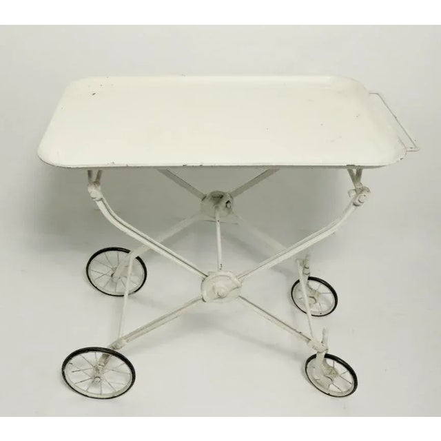 Very cool early industrial cart, probably originally from a hospital. Cast iron, with a steel tray top. Currently in later...