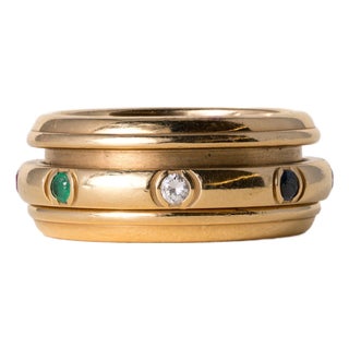 Late 20th Century Piaget Possession 18k Gold Diamond and Gemstone Spinner Ring Band, Size 6.5 For Sale