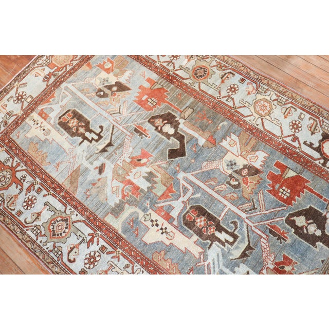 A large accent size early 20th century Persian Malayer rug featuring an abstract pattern Measures: 4'1" x 6'