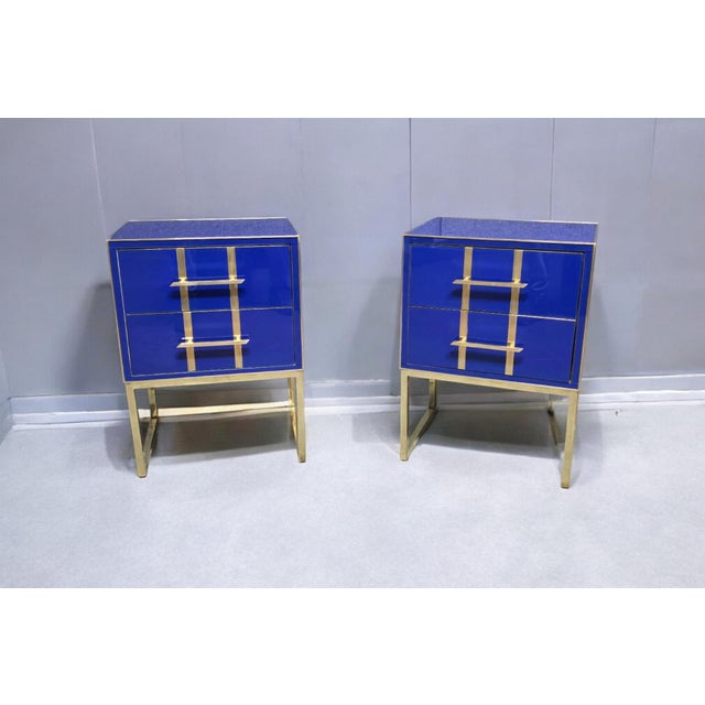 These beautiful bedside tables are handmade in Italy. They have a blue glass top and drawers, hand-blown by skilled...