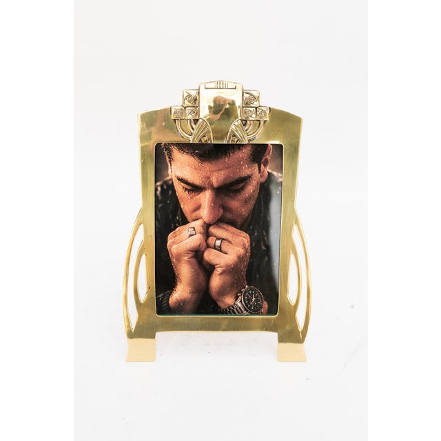 Brass polished and stove enameled Glass in front Picture size max: H:16,5cm W: 11cm