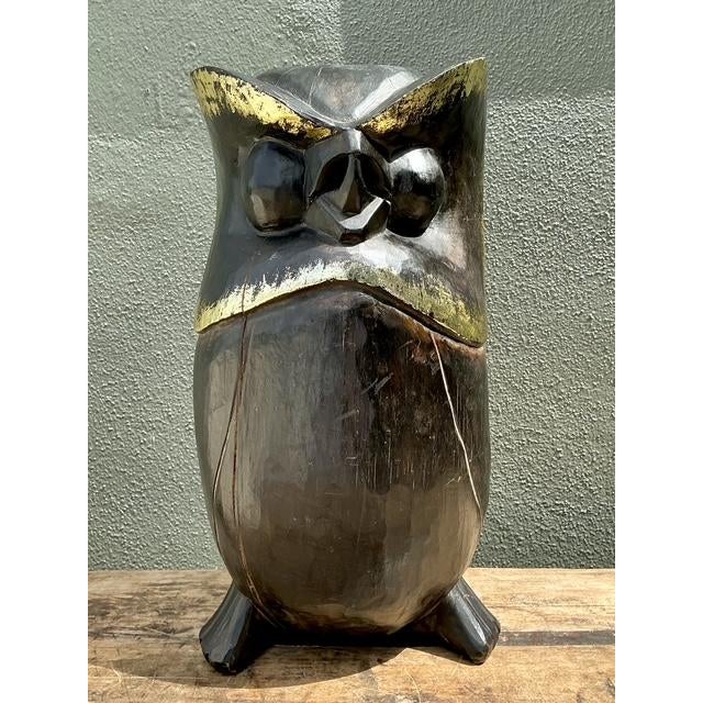 This striking vintage hand-carved wood owl sculpture is a masterclass in Brutalist-inspired folk art. Hand-chiseled from a...