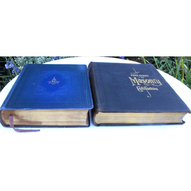 Two complete, intact of vintage Masonic books editions, each featuring incisive histories and unique features designed...
