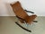Vintage rocking chair by Takeshi Nii from Japan, 1950s. Made of aluminum, wood, and leather. The chair is foldable and...