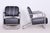 This designe pair of armchairs originating from the 1930s represents an exceptional and highly valued example of...