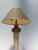 Decorative vintage table lamp by Fine Art Lamps Co., Hialeah, Florida, USA. The lamp features an elegant base with a...