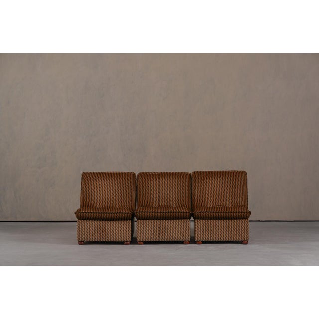 This vintage modular sofa and table set was produced in Italy during the 1970's and combines comfort, flexibility, and...