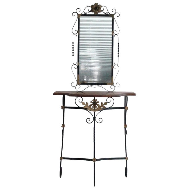 Iron base console with gilded floral accents and mirror with Walnut top. table height 30 inches