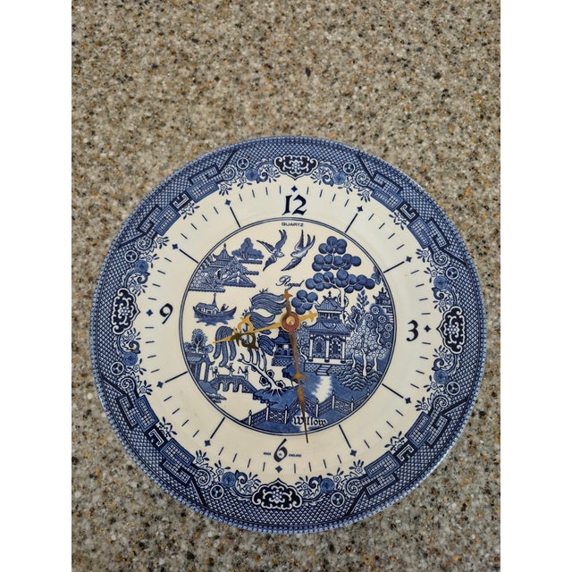 Two clocks in the same condition and pattern are vintage Churchill England "Royal Willow" pattern ceramic plate wall...
