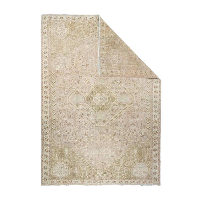 In a much-reduced tonality, this SW Persian scatter shows four corner "knots" and a central "knot". Side feather...