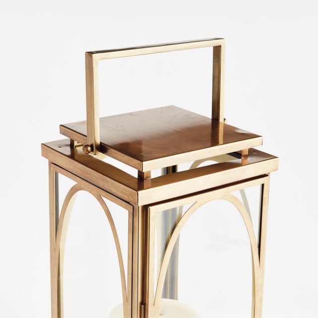 In a nod to the colonial revival period, this lantern is designed with a signature oval frame detail. The open top and...