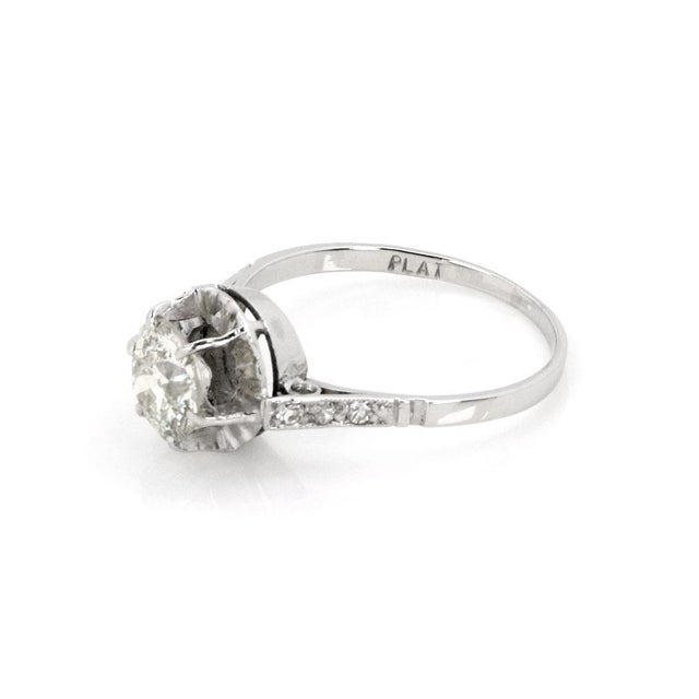 ​This is a gorgeous Art Deco diamond ring, it is crafted from platinum and has a 1.39 carat round old European cut diamond...