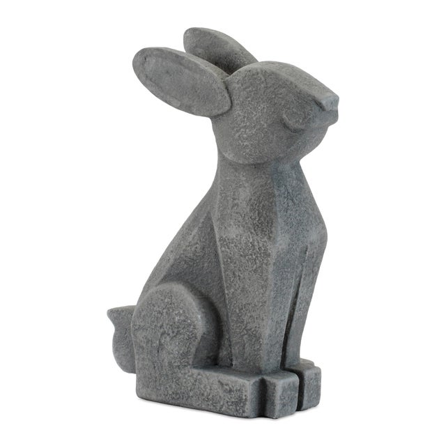Bring a contemporary, nature-inspired touch to your space with this set of two Modern Sitting Bunny Figurines. Crafted...