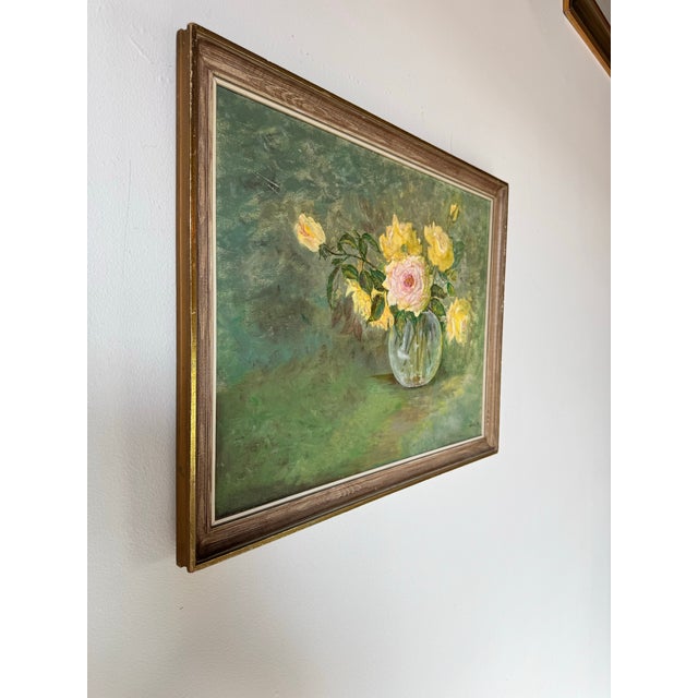 This exquisite 1976 vintage still-life oil painting captures a delicate bouquet of yellow and pink roses arranged in a...