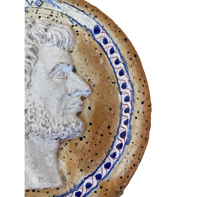 Old Greek Roman terracotta plaque with side profile of a Roman emperor, most likely Hadrian an ancient Roman emperor from...