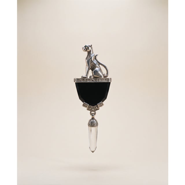 Sterling Silver Panther Motif Pin/Brooch - Onyx, Synthetic Emerald Eyes and Marcasite and Articulated Pin-Back Closure....