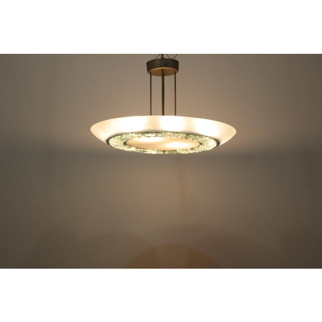 Large chandelier, model 2459 Curved satin-finish crystal, chiselled crystal, nickel-plated brass. Prod. Fontana Arte, ca....