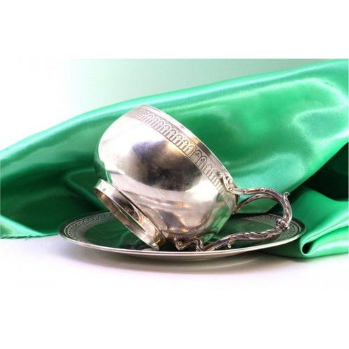 Silver Cup and Saucer with Raised Borders and Cut-Out Handle, Set of 2, in Very Good conditions. Designed before 1890 This...