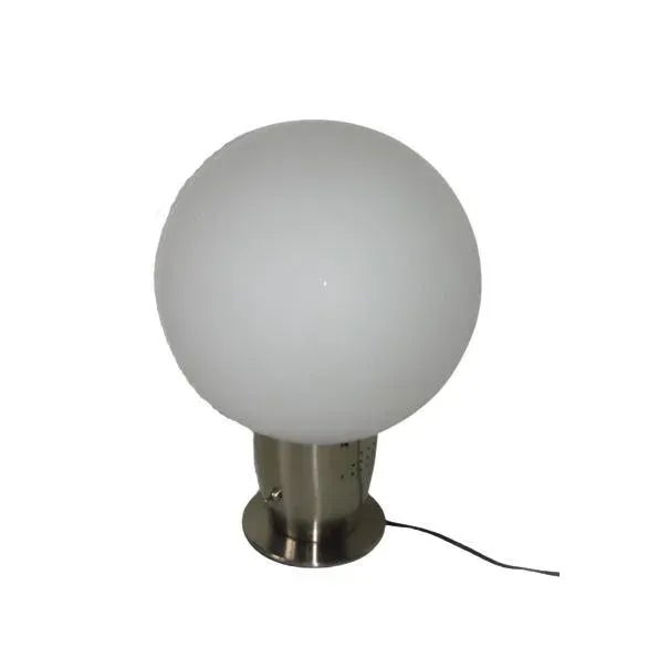 Modern table lamp, 80s. It was made of steel and glass. The lamp is preserved in very good condition, requires E27 bulb....