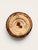 A glazed ceramic vase by Gene Farkus, designed with a rounded bottle-form body, narrow neck, and footed base. The piece...
