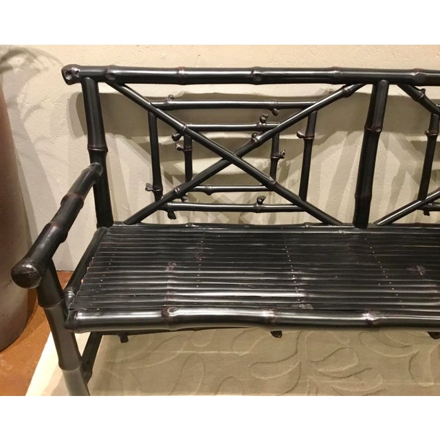 Stylish Asian Style Black Faux Bamboo Bench, subtle red accents, showroom floor sample