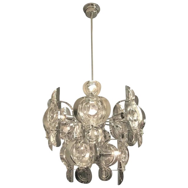Italian, Mid-Century Gaetano Sciolari two-tier chandelier featuring a Sputnik frame and stepped canopy in the original...