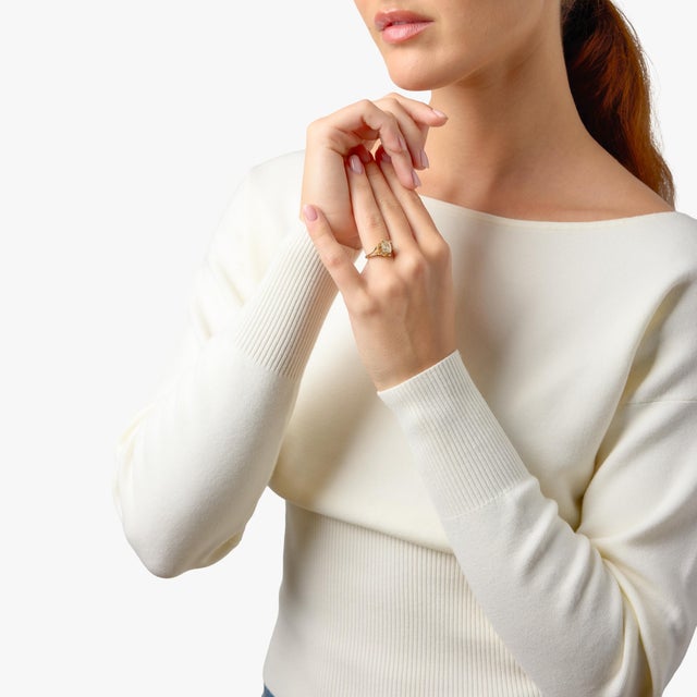 This romantic Victorian engagement ring centers on a beautifully hand-cut 1.35 carat old mine cut diamond, full of antique...