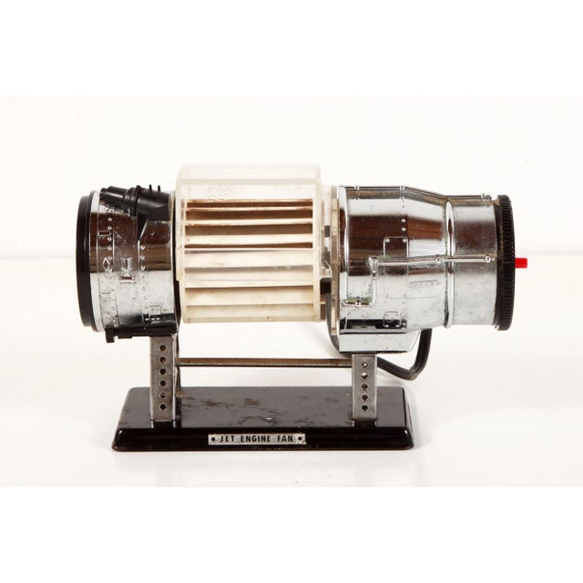 This is a SUPER AWESOME vintage c.1960's desk fan in the form of a model jet engine! Has an adjustable clear shield that...