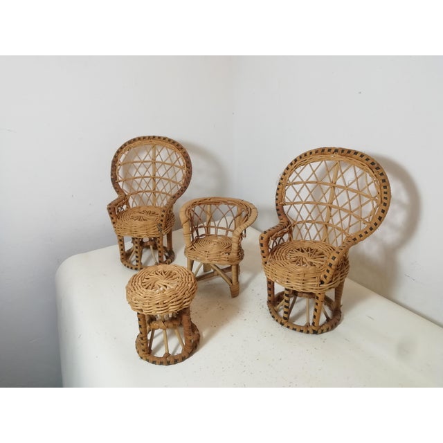 Charming wicker living room set. It was used by furniture makers to present their products to customers. Once customers...