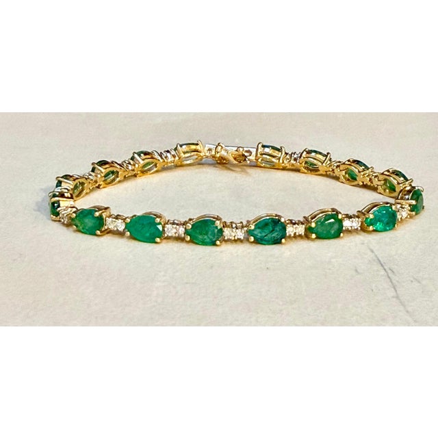 12 Carat Natural Zambian Emerald &amp; Diamond Tennis Bracelet 14 Karat Yellow Gold This exceptionally affordable Tennis...