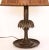 Pleated mica shade lamp with middle eastern stylized bronze palm tree base. Some silver high lights on the palm leaves....