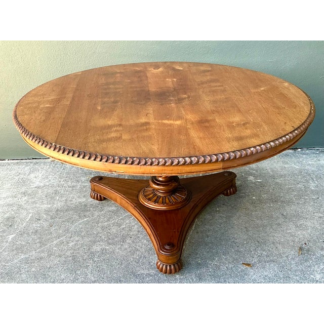 This exceptional 60-inch round dining table is a masterclass in Regency-inspired elegance, bringing an authoritative...