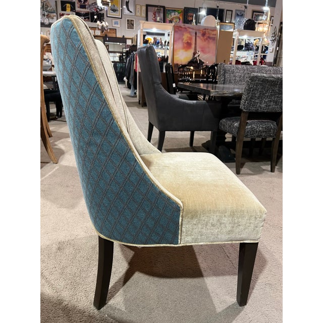Elegant and inviting, this Blue and Ivory Diamond Dining Chair brings a refined touch of modern sophistication to any...