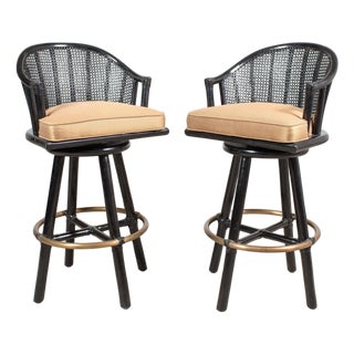 Pair of McGuire Lacquered Rattan Cane Swivel Barstools For Sale
