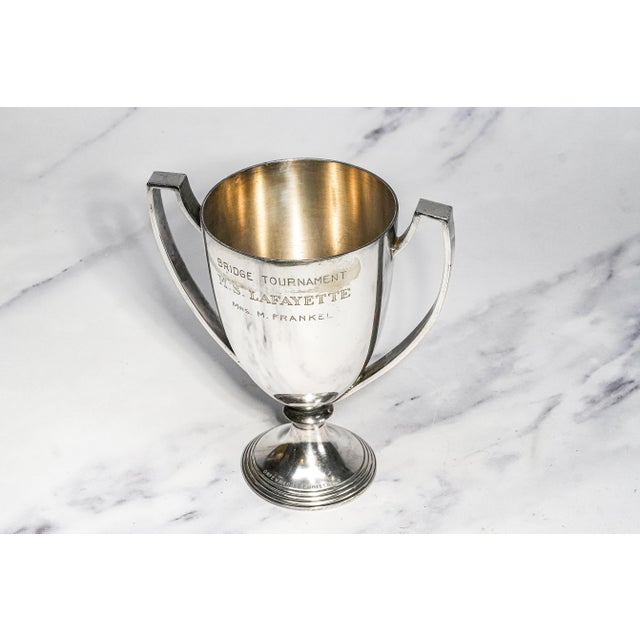 An exceptional and historically significant piece of ocean liner memorabilia, this circa 1930s Christofle silverplate...