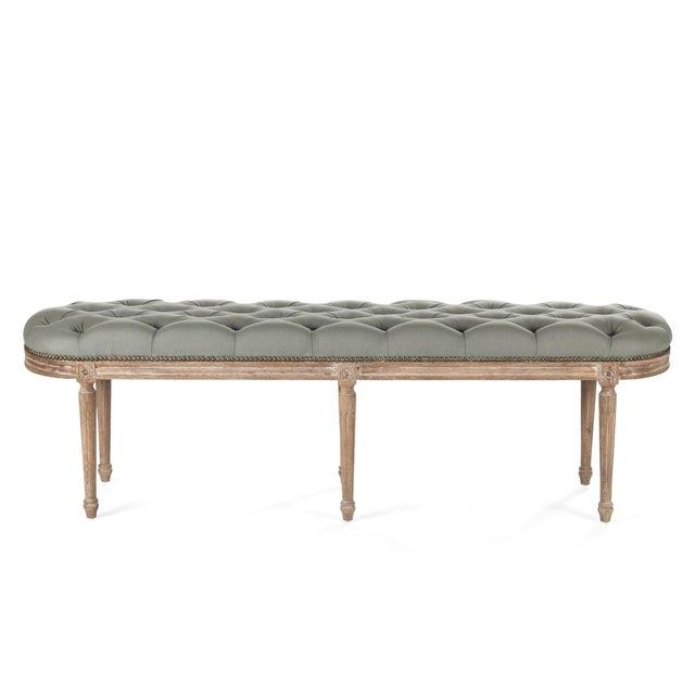 The Michel Tufted Bench from Zentique is a French Louis XVI bench with a button-tufted sage linen seat on a limed grey oak...