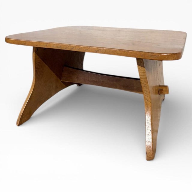 This solid elm coffee table combines mid-century rustic design with durable elm wood furniture craftsmanship to create a...