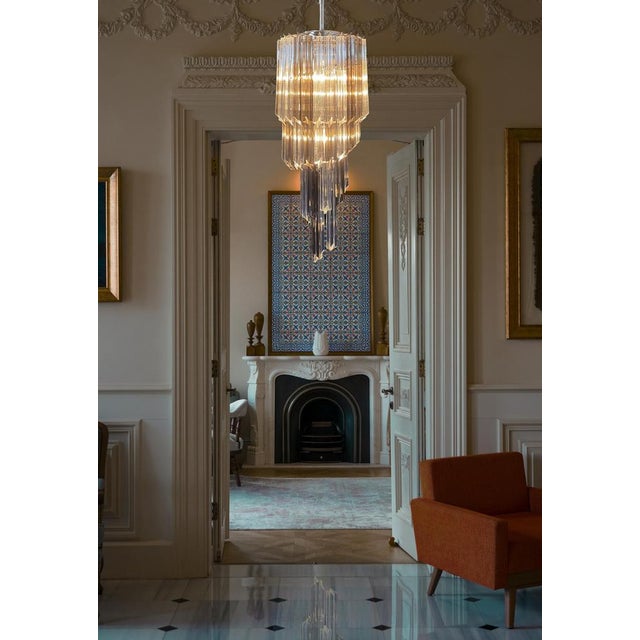 Beautiful Big Murano chandeliers each made by 54 Murano crystal prism (quadriedri) in a chrome metal frame. The shape of...