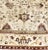 Authentic hand knotted antique Indian Agra rug. cream field decorated with stylized flowers. 9'9"x 13'2". Circa 1900.