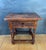 This charming pair of Spanish bedside tables dates from the mid-20th century and reflects the traditional rustic furniture...