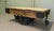 A Unique Wood Framed Industrial Coffee Table The table has a thick Wooden Top and is set on 2 cast iron railway type...