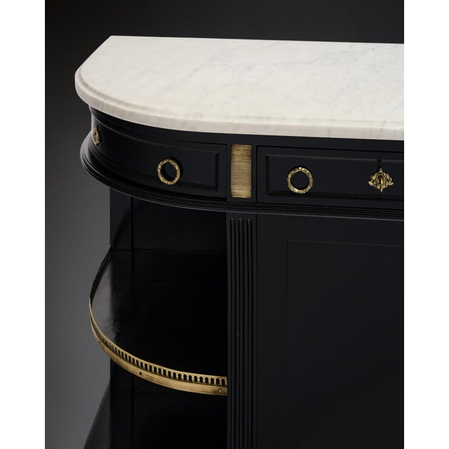 An elegant and unusually designed French Louis XVI style buffet or sideboard, late 19th century, crafted in mahogany,...