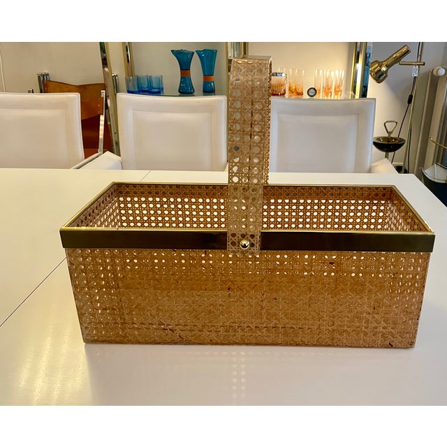 Very well-maintained newspaper rack or storage basket with a polished surface