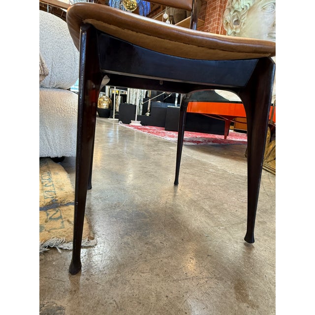 Refined set of six Italian mid-century modern dining chairs designed by Ico Parisi and produced by Ariberto Colombo. Each...