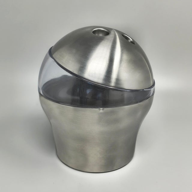 Step back into the futuristic glamour of the 1970s with this stunning, highly collectible "bowling" ice bucket designed by...