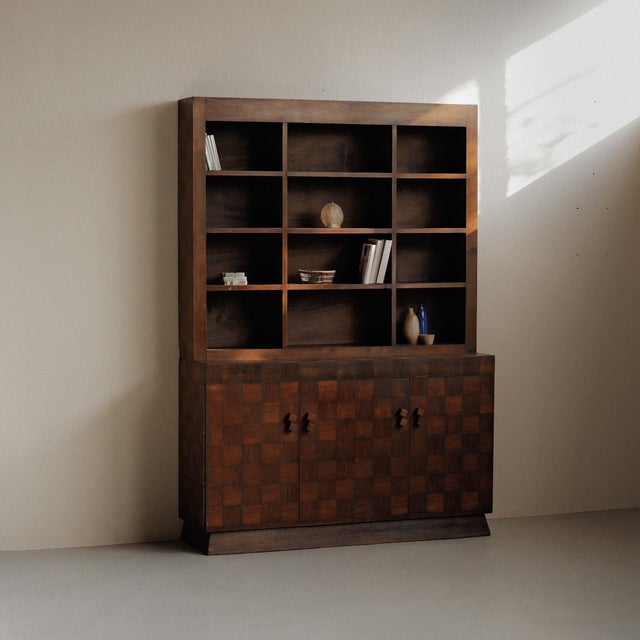 Impressive french art deco two-part cabinet dating from around 1930, crafted in oak veneer and defined by its strong...