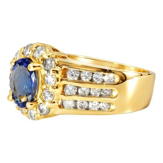 Late 20th Century 14K Yellow Gold Solitaire Tanzanite Diamond Ring, Size 6.75 For Sale