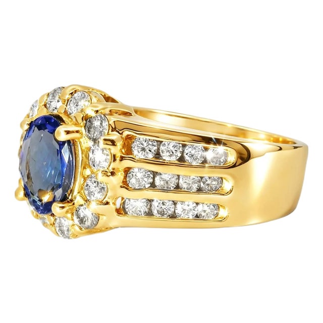 Late 20th Century 14K Yellow Gold Solitaire Tanzanite Diamond Ring, Size 6.75 For Sale